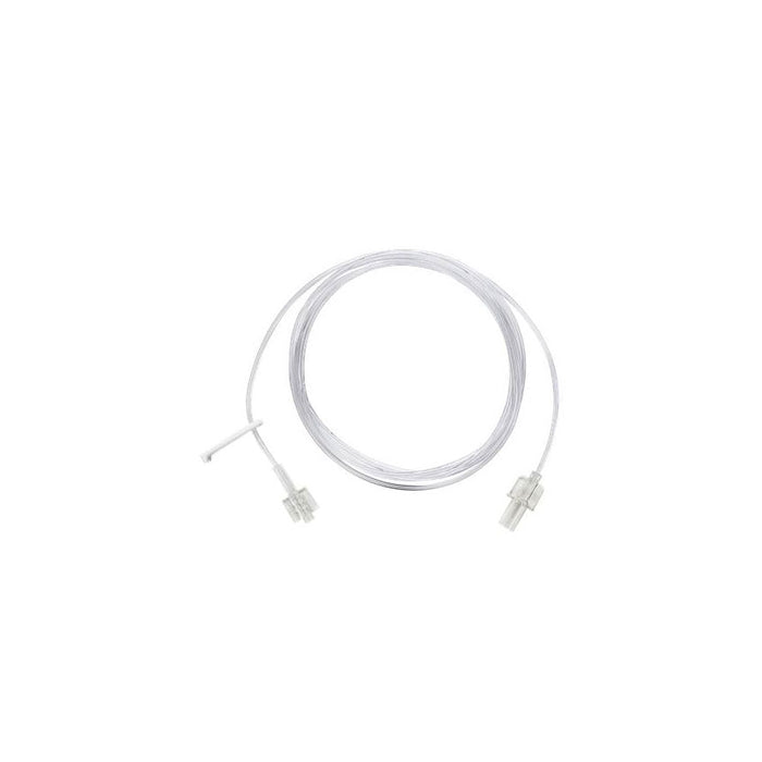 A clear plastic tube, coiled, with connectors at each end, sits on a white background.
