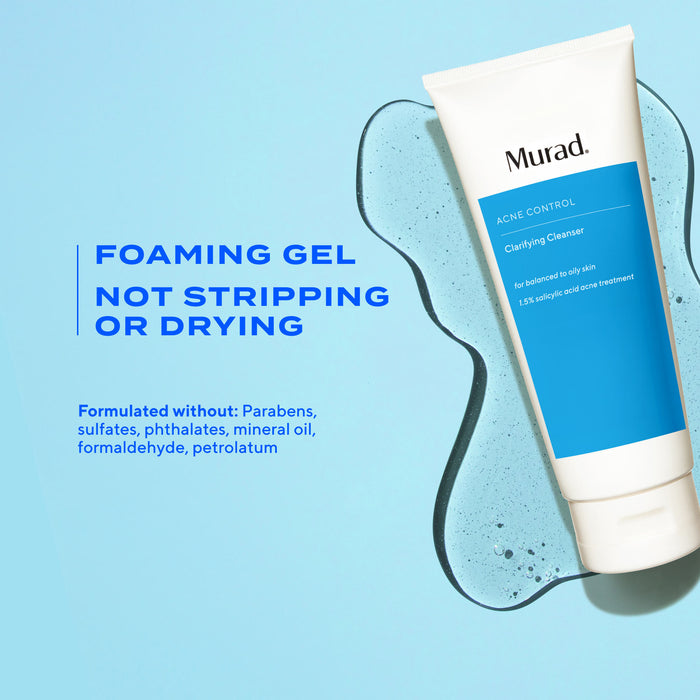 A white squeeze tube of Murad Acne Control Cleansing Cleanser with a bright blue label block, shown on a blue background