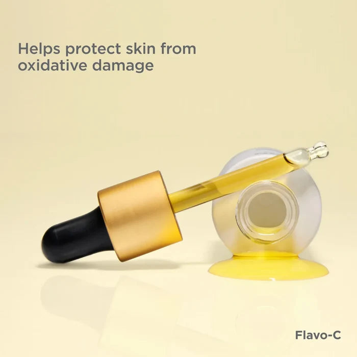 Flavo-C serum dropper with yellow vitamin C serum, helping protect skin from oxidative damage