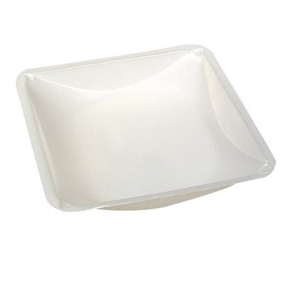 A small, square, white plastic tray sits on a plain background.