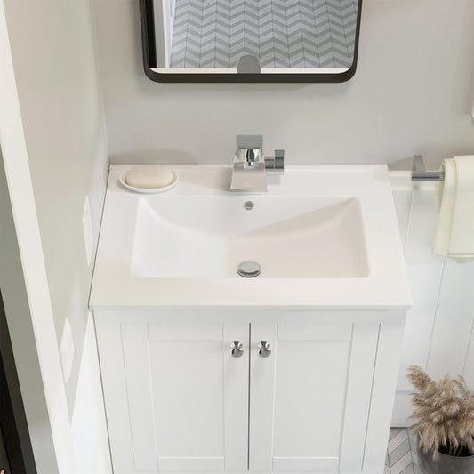 Bathroom vanity with sink, mirror, and towel in a modern setting