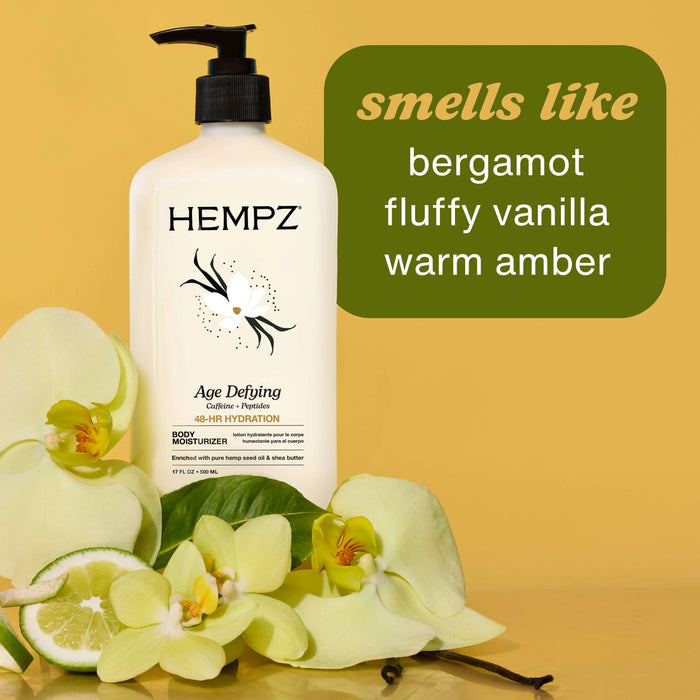 Hempz body moisturizer bottle with flowers and text describing scent on a yellow background