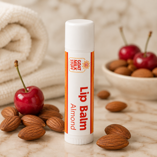 Lip balm with almonds and cherries on a marble surface