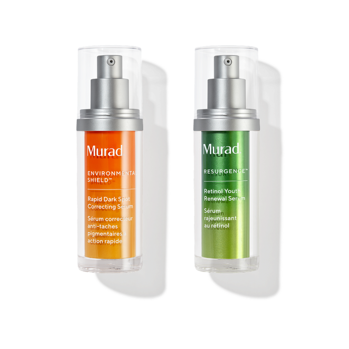 Two Murad skincare pump bottles on a white background, one with an orange label and one with a green label, both in clear cylindrical packaging with silver pumps.