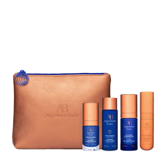 Augustinus Bader The AB Essentials Set with four skincare products and travel pouch