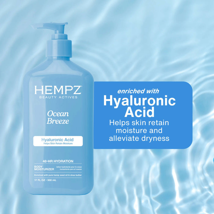 Hempz Ocean Breeze body moisturizer with Hyaluronic Acid on a blue water background