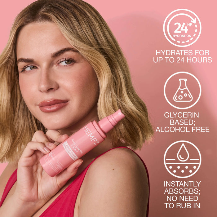 Woman holding Hempz Sweet Jasmine & Rose Body Moisturizer Spray with Collagen Booster bottle with product features on a pink background