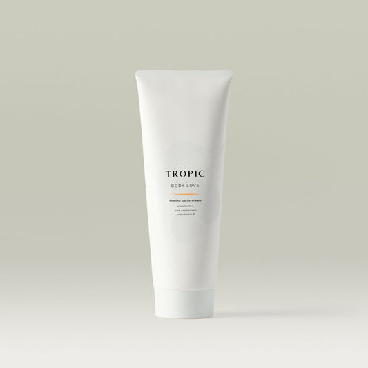 White Tropic tube labelled “Body Love,” a firming buttercream with shea butter, pink peppercorn, and vitamin E, displayed on a neutral background.