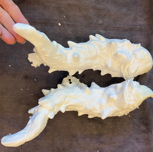 CAST DRAGON HORN PAIR
