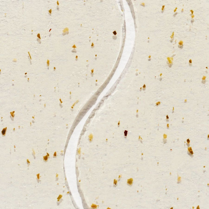 Close-up of a translucent, speckled hydrogel texture featuring gold and brown botanical flecks, with a curved indent designed for a soothing and revitalizing skincare treatment.