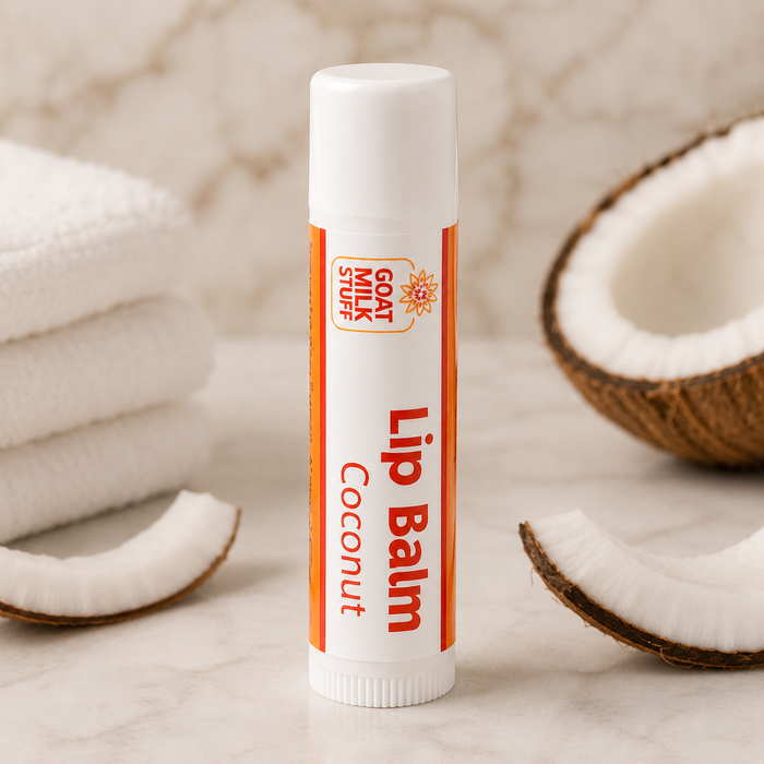 Lip balm stick with coconut pieces on a neutral background