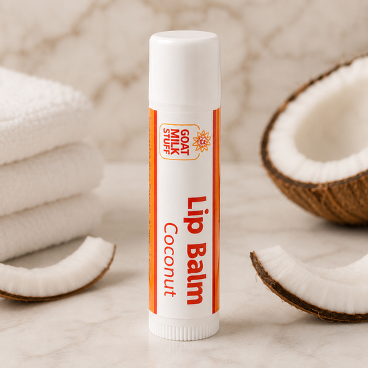 Lip balm stick with coconut pieces on a neutral background