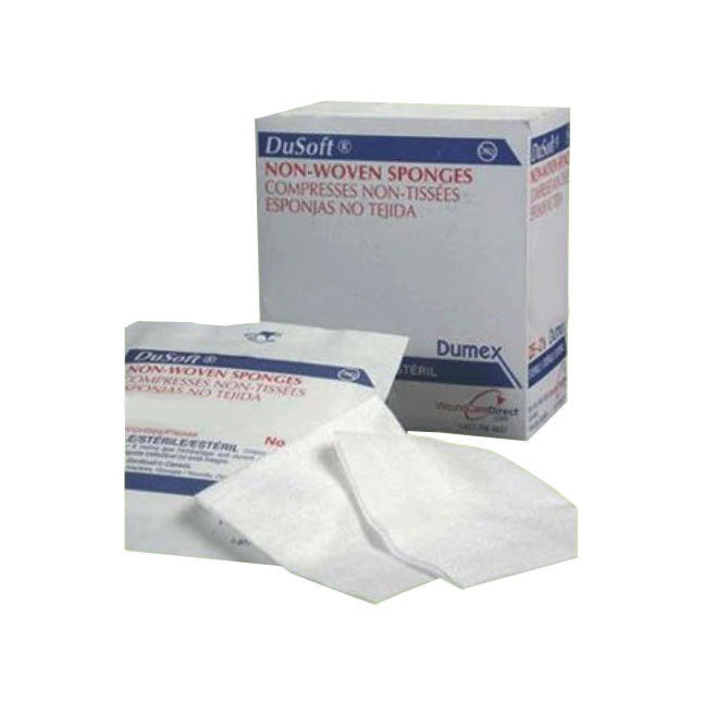 Two sterile non-woven sponges sit atop their packaging; one box is unopened, the other is partially opened, showing additional sponges.