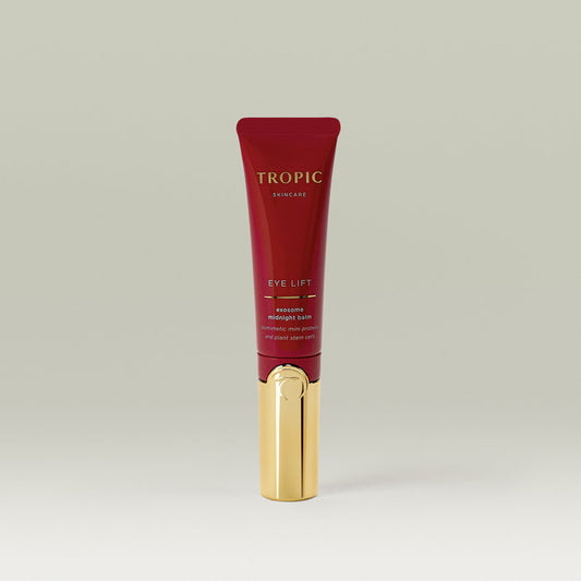 Tropic Skincare Eye Lift Exosome Midnight Balm in a sleek red and gold