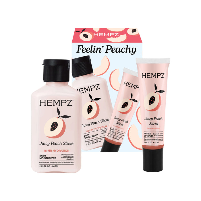 Hempz Juicy Peach Slices product set including body moisturizer, lip balm, and packaging on a white background.