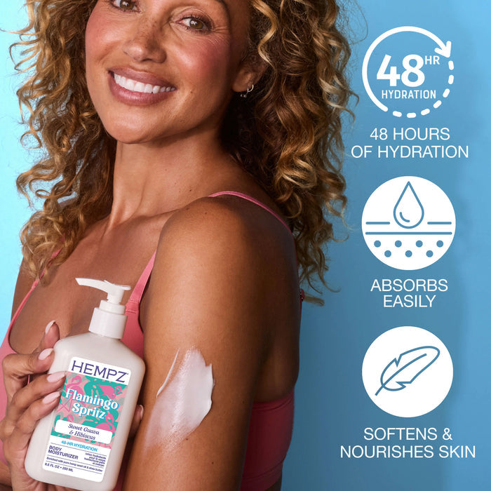 Woman holding Hempz Flamingo Spirit sunscreen with product features on a blue background