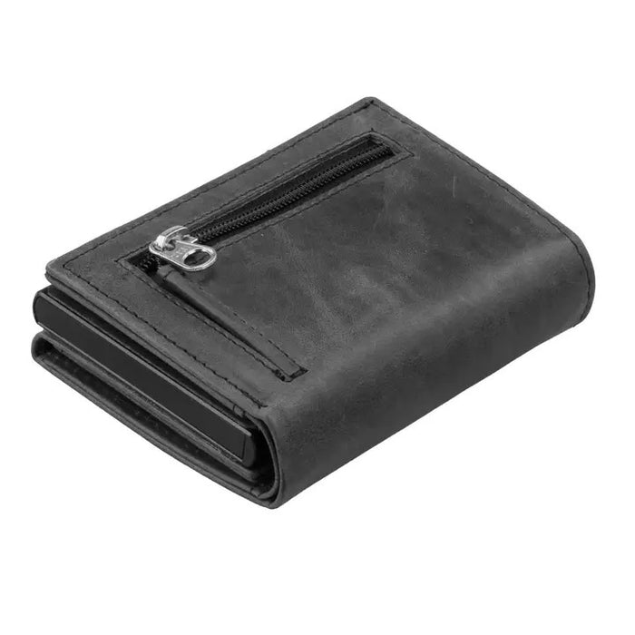 A closed black GARZINI Slim Trifold RFID-blocking leather wallet with metal card holder and coin pocket, showing the brand name on the side and cards partially visible along the edge.