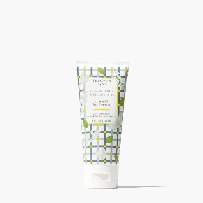 Tube of Beekman 1802's mini Glacial Mint & Eucalyptus Hand Cream standing on a white background.