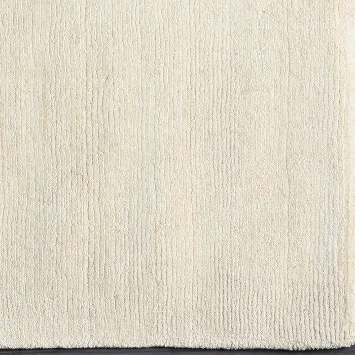Close-up of a textured beige carpet