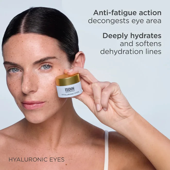 ISDIN Isdinceutics Hyaluronic Eyes jar held beside eye, anti-fatigue and hydration claims