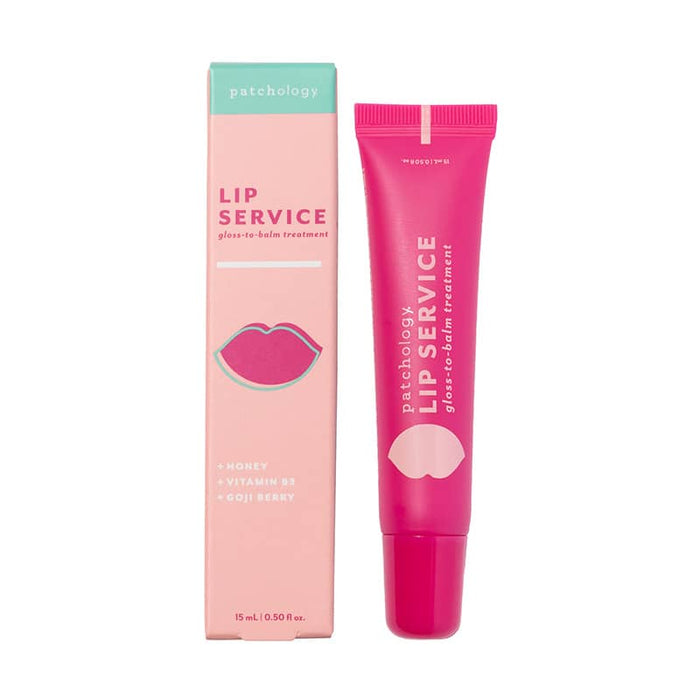 Pink lip gloss on a white background