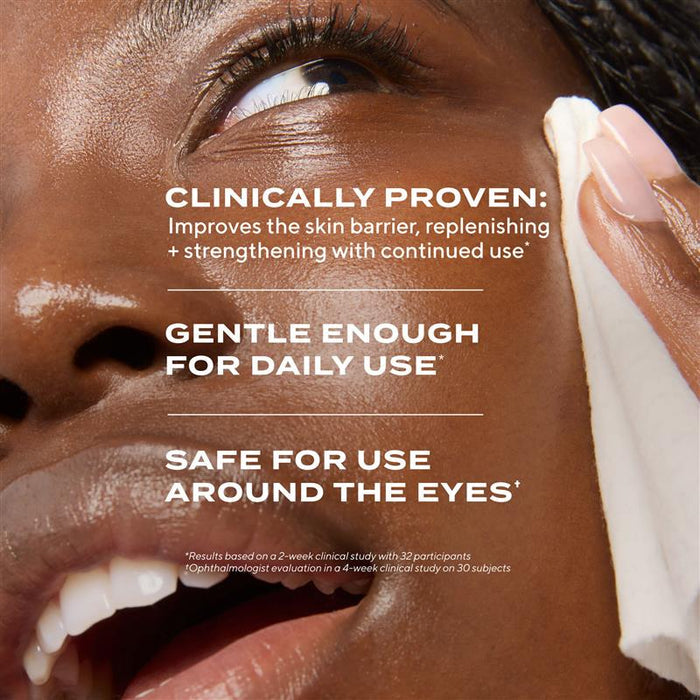 Close-up of a person applying cream around their eye with product claims text overlay.