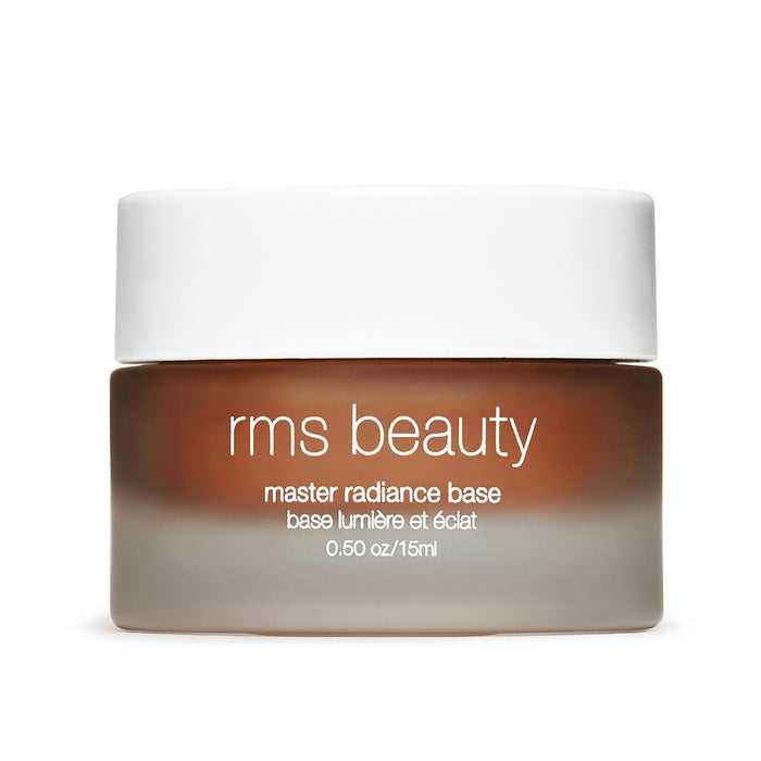 Glass jar of RMS Beauty Master Radiance Base with white lid, showcasing creamy, skincare-infused makeup for a natural, radiant glow and clean beauty routine.