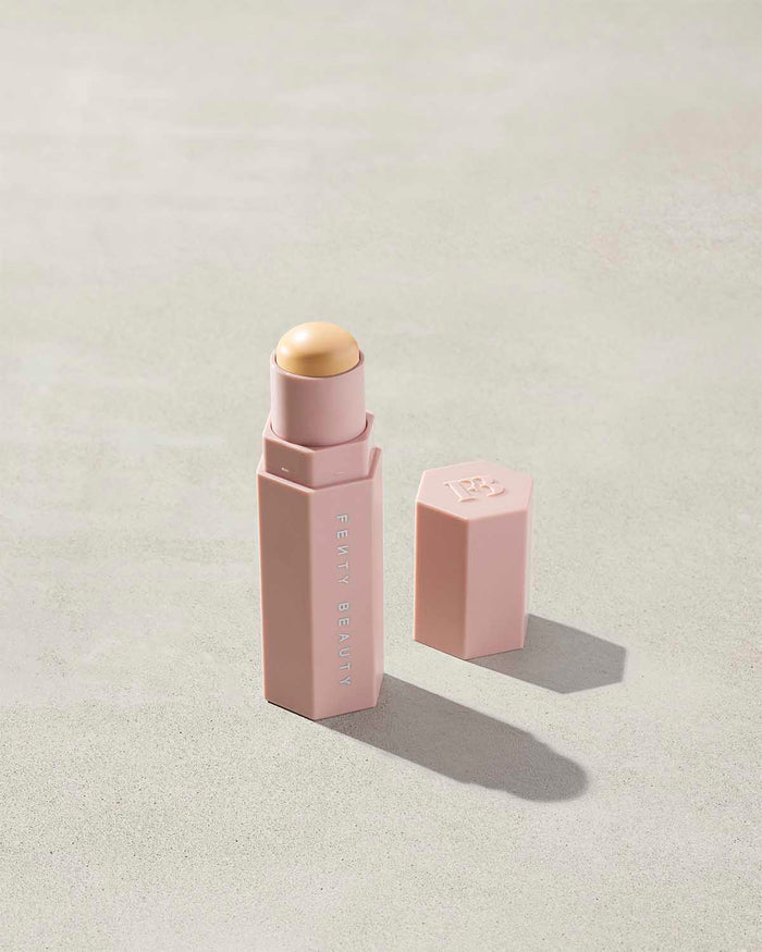 Match Stix Corrector Skinstick shown in shade Banana with open packaging on a concrete background.
