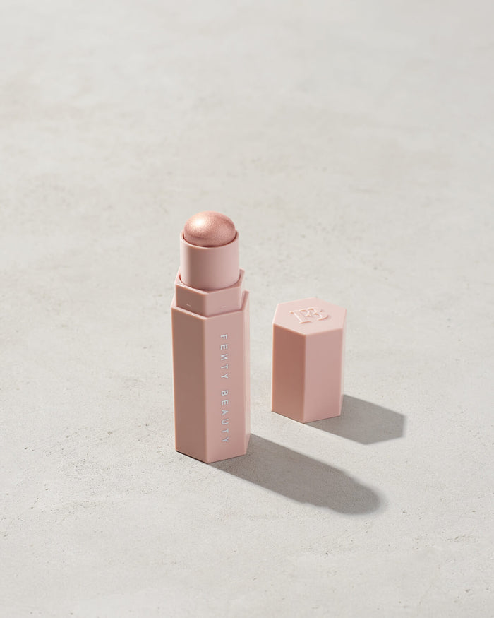 Match Stix Shimmer Skinstick shown in shade Starstruck on a concrete background.