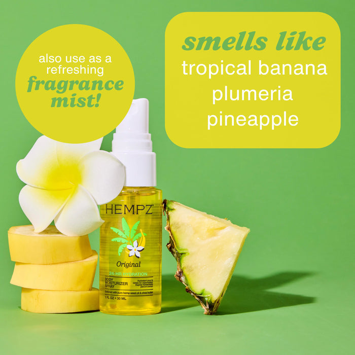 Hempz Original Body Moisturizer Spray with notes of pineapple, banana, and plumeria on a green background