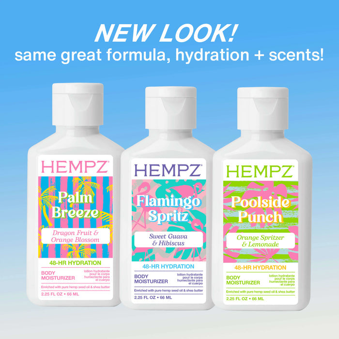 Three Hempz Palm Sp;rings body moisturizer bottles with colorful labels on a blue background