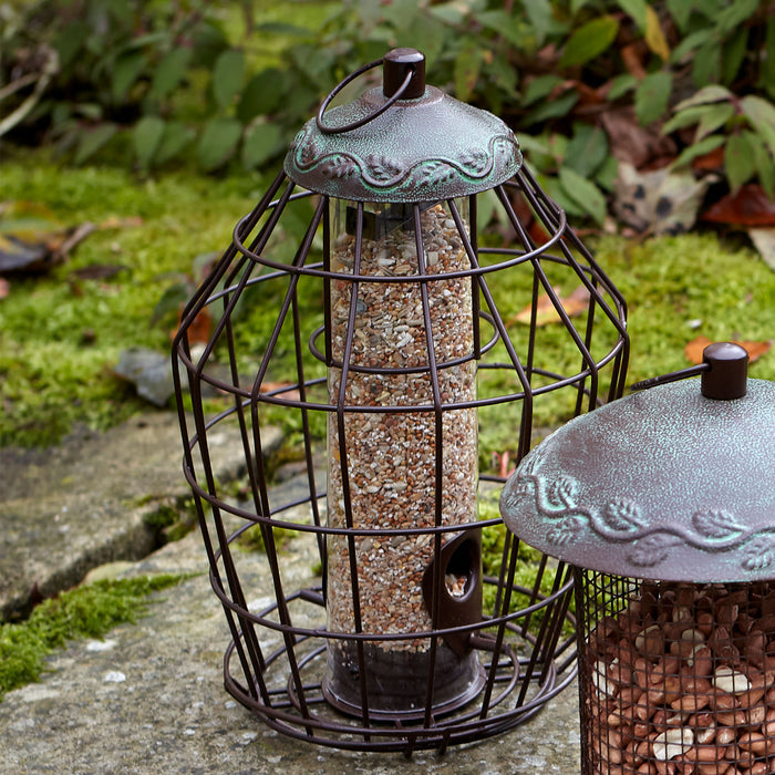 Peckish Secret Garden Squirrel Proof Seed Feeder with seed mix in