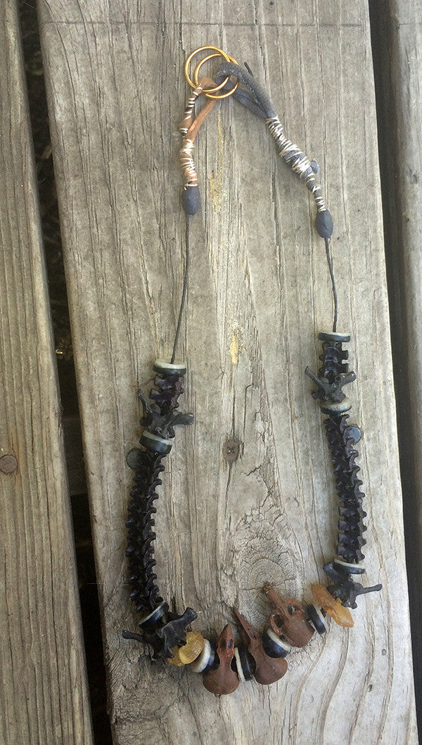 POST APOCALYPTIC NECKLACE- SNAKE BONES , CAST SKULLS