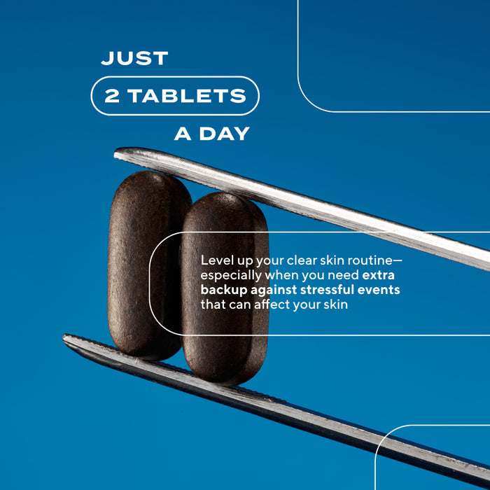 Two tablets balanced on a pair of tweezers with promotional text on a blue background