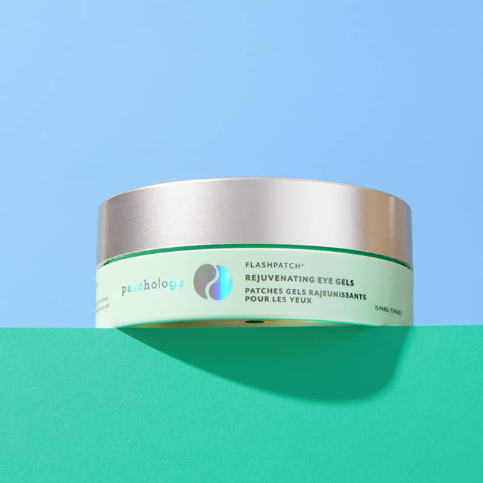 Closed jar of Patchology FlashPatch Rejuvenating Eye Gels with a silver lid, resting on a dual-toned blue and green background.