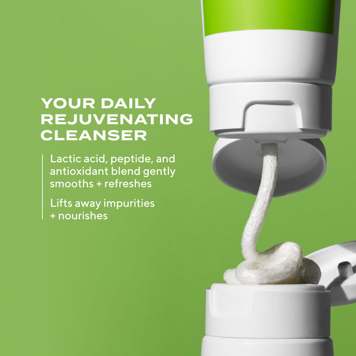 A squeeze tube of Murad Resilience Sunscreen Cleansing Cream squeezing out product with text showing your daily rejuvenating cleanser featuring lactic acid, peptide, and antioxidant blend gently smooths + refreshes and lifts away impurities + nourishes on green background