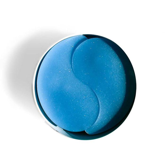 Patchology Restoring Night eye gel with subtle shimmer in round shape, isolated on white background for eye care treatment
