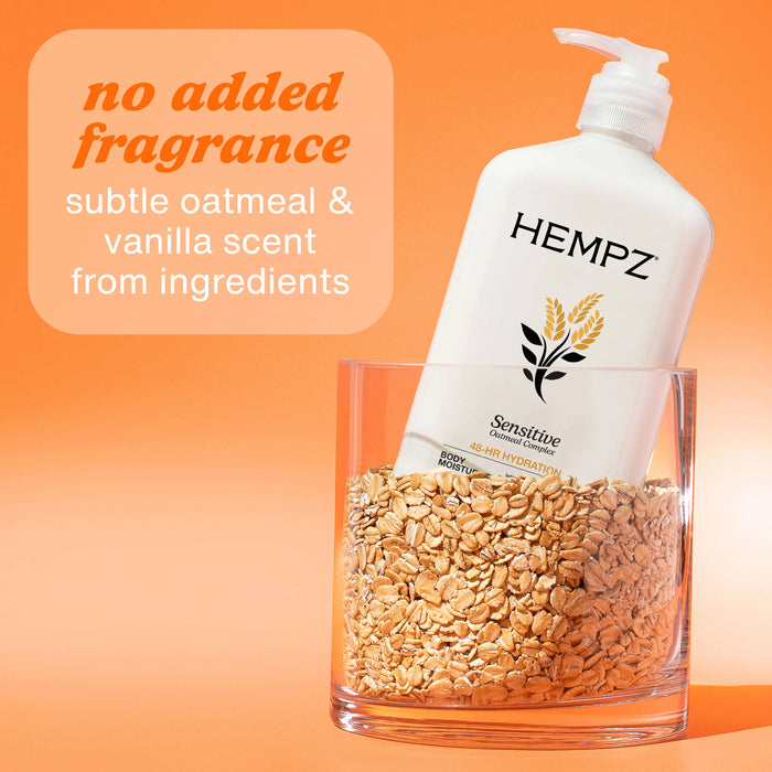 Hempz body wash bottle with oats in a glass container on an orange background