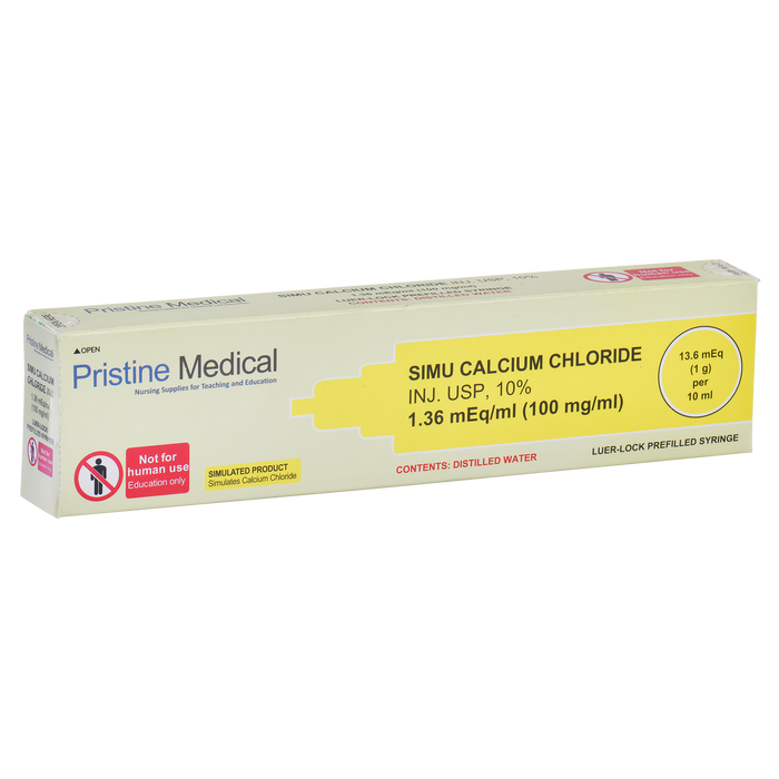 A simulated calcium chloride injection sits in its box; it is labeled "SIMU CALCIUM CHLORIDE INJ. USP, 10% 1.36 mEq/ml (100 mg/ml)," "Not for human use. Education only," and further details on contents and quantity.