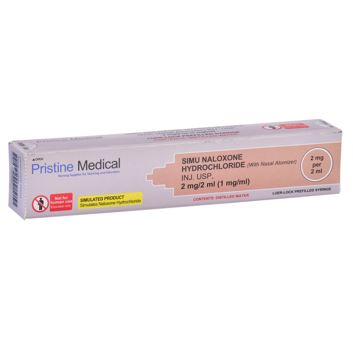A simulated naloxone hydrochloride syringe rests on a surface. The box indicates it's a simulated product for education, not for human use. It contains 2mg/2ml of distilled water.