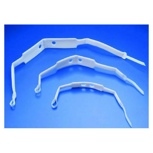 Three translucent, curved medical instruments are displayed against a solid blue background. They appear to be some type of cannula or similar device.