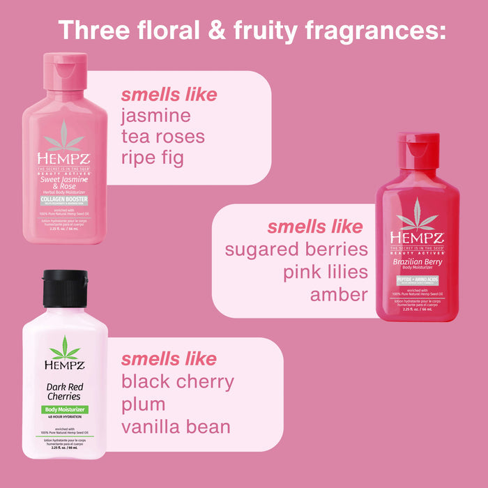 Three Hempz body moisturizer bottles with fragrances listed on a pink background
