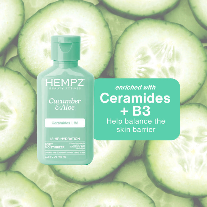 Hempz Cucumber & Aloe body moisturizer bottle on a background of sliced cucumbers.
