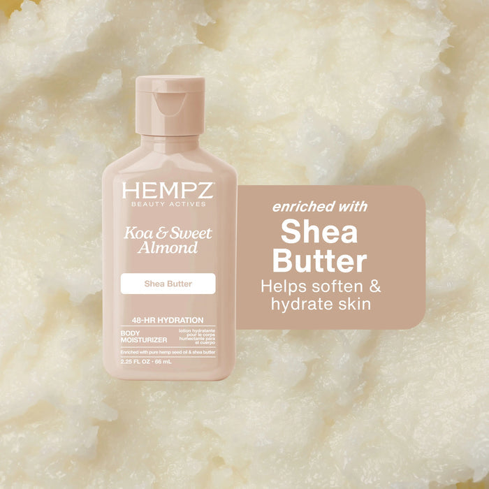 Hempz Koa & Sweet Almond body moisturizer bottle on a textured background
