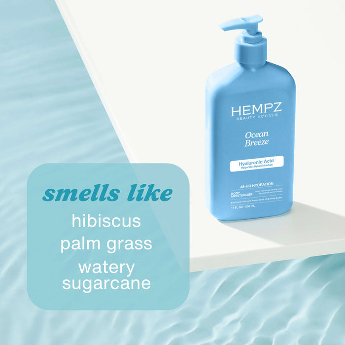 Blue bottle of Hempz Ocean Breeze product with text describing its fragrance on a light blue background