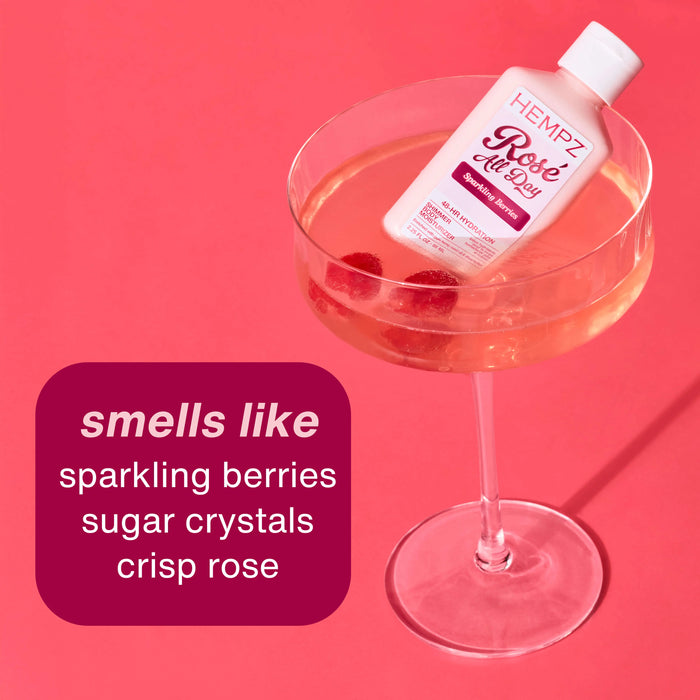 Hempz  Rosé All Day mini bottle in a glass with a pink background and product description text.