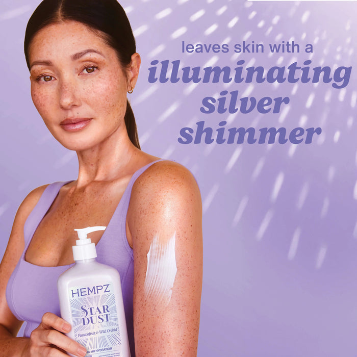 Woman holding Hempz Star Dust lotion with text on a purple background