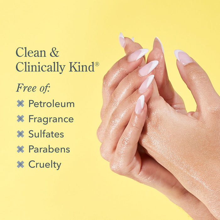 Closeup shot of models hands rubbing together on the right of the image and words on the left saying that the Wonder Milk is free of Petroleum, fragrance, sulfates, parabens, and cruelty, all on a yellow background.